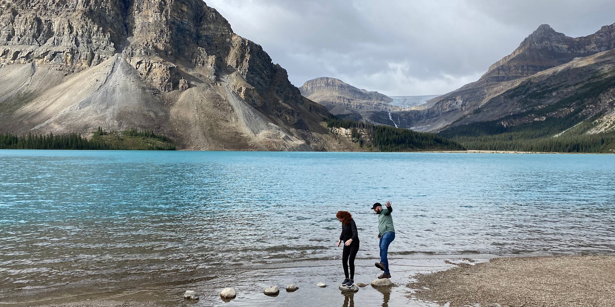 Guests exploring a lake in the Canadian Rockies